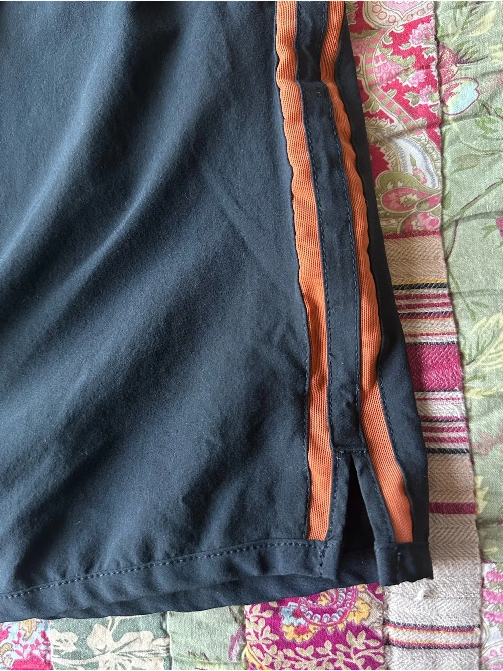 Nike Men’s Black Athletic Shorts with Orange Side Stripes